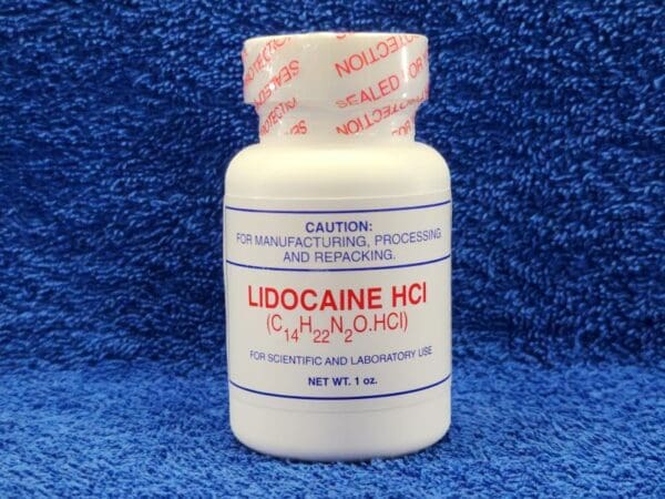 A bottle of Lidocaine HCI on a blue background.
