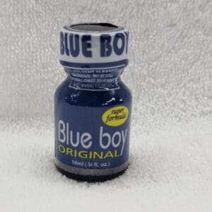 A bottle of blue boy original on a white towel.