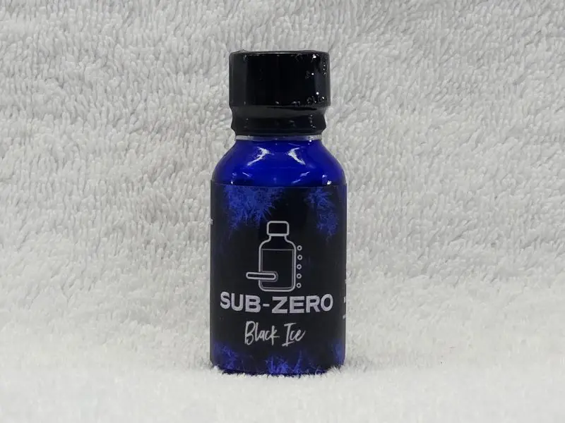A blue bottle with the words sub zero on it.