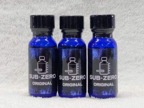 Three bottles of sub zero original on a white background.