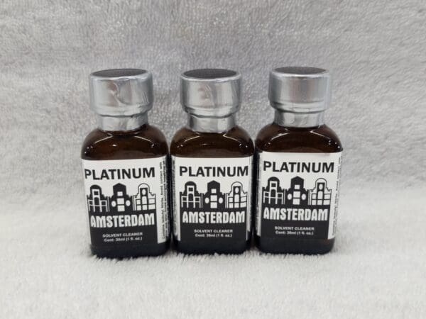 Three bottles of platinum amsterdam on a white background