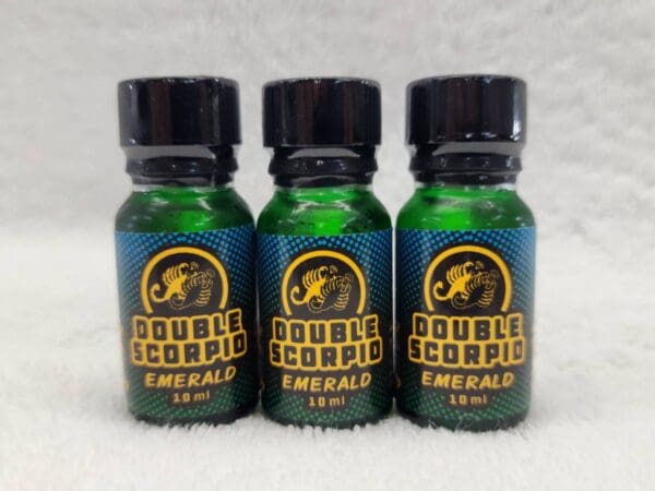 Three bottles of double scorpion e-liquid.