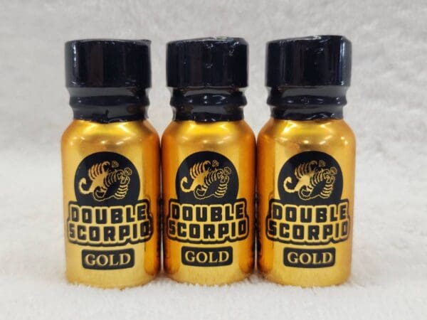 Three bottles of double scorpio gold.