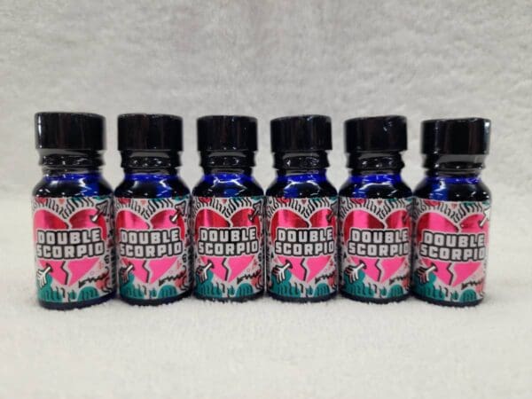 A group of bottles with a blue and pink heart on them.