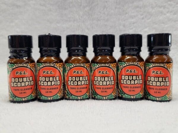 A set of five bottles of double comb essential oil.