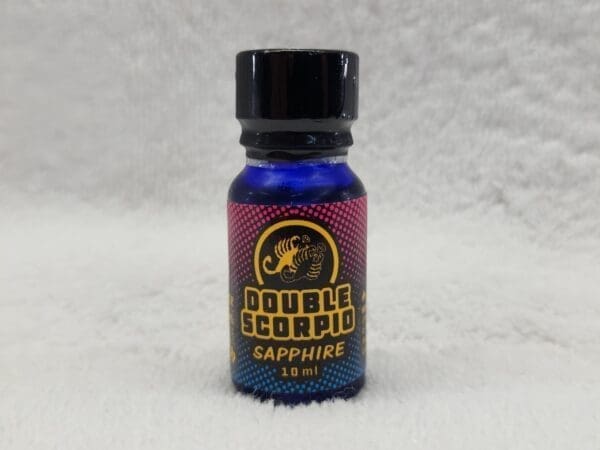 A bottle of double ecig with a blue bottle on top.