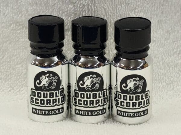 Three bottles of double scorpion white gold.