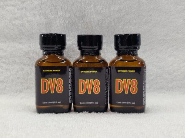 A group of three bottles of dv 8