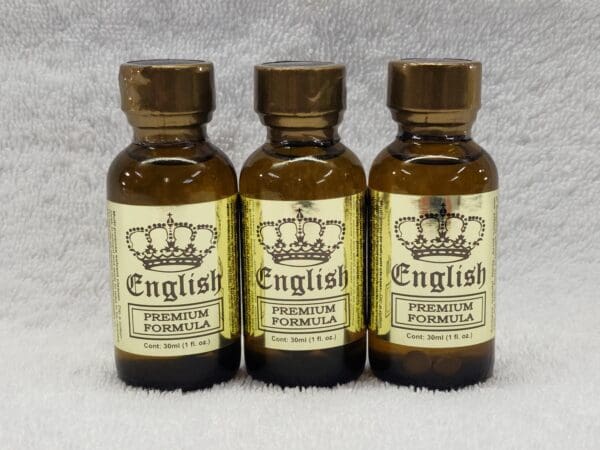 Three bottles of english premium formula on a white background