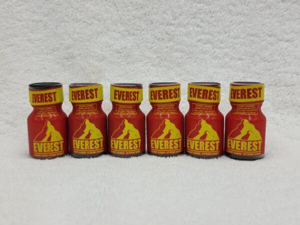 A group of six bottles of everest poppers.