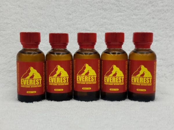 A group of five bottles of everest poppers.