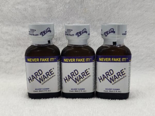 Three bottles of hard ware are shown on a white background.