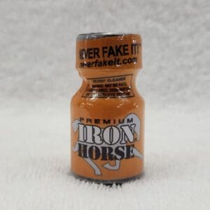 A bottle of Iron Horse on a white surface.