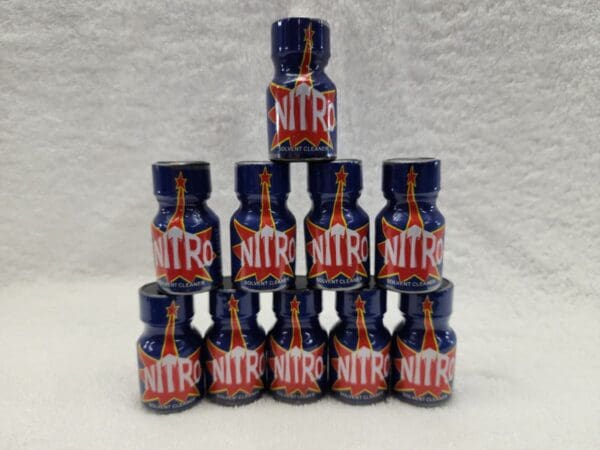 A pyramid of bottles with nitro on them