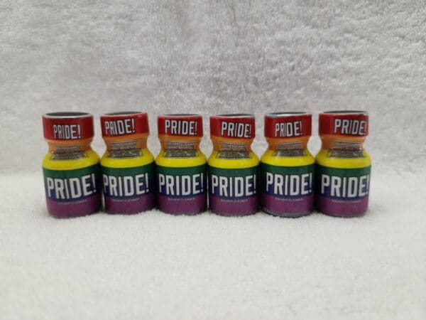 A row of pride poppers sitting on top of a table.