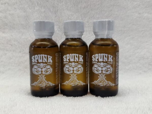 Three bottles of spunk on a white background