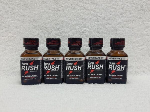 A group of five bottles of rush shot.