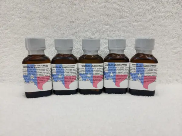 A row of bottles with texas on them