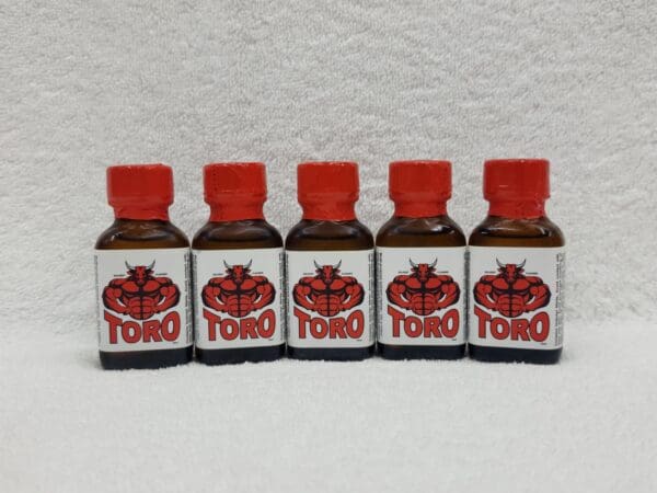 A group of five bottles of toro