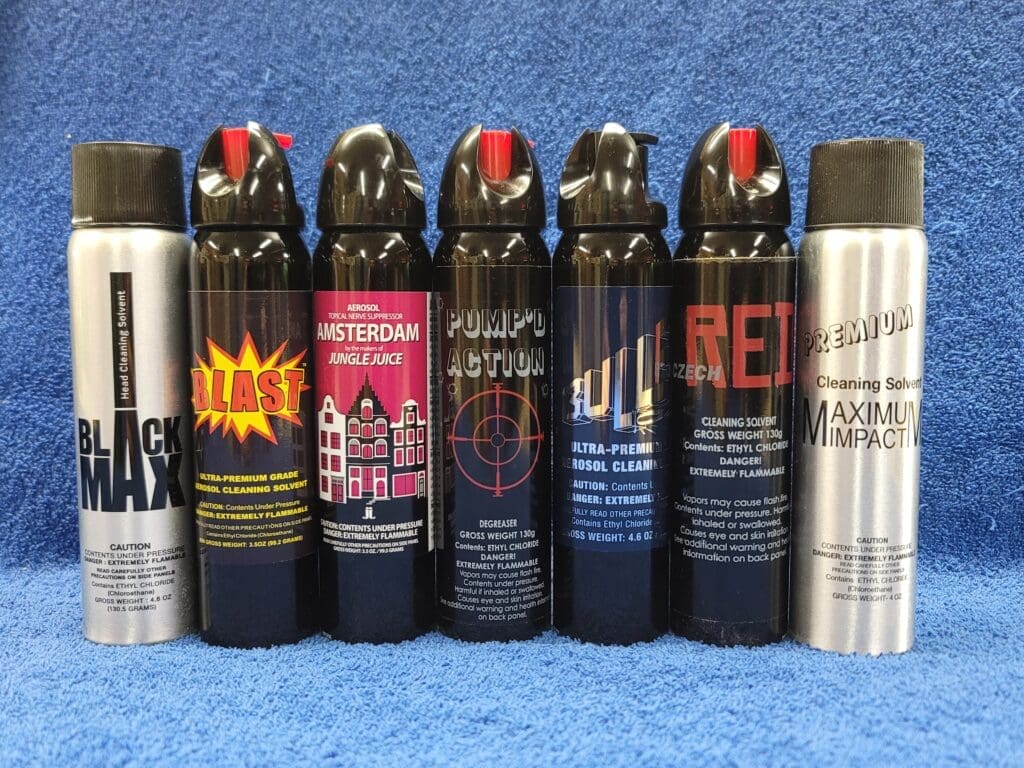 A row of different types of spray paint.